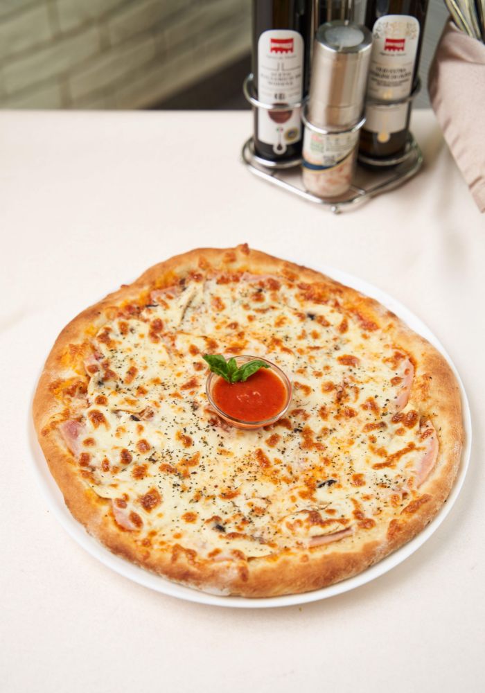 Pizza prosciutto e funghi